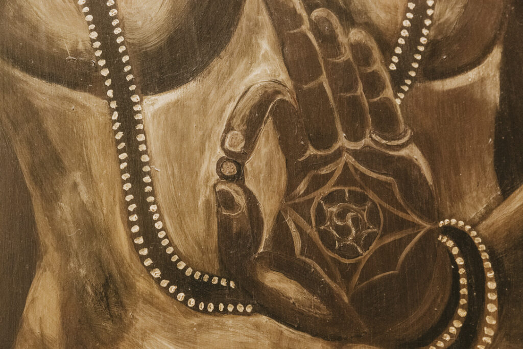 Buddha mudra painting at Karma Yoga Center