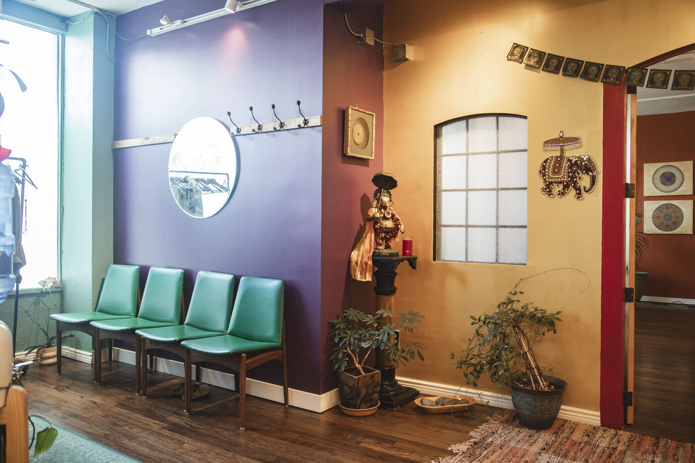 Changing area and shoe racks at Karma Yoga Center