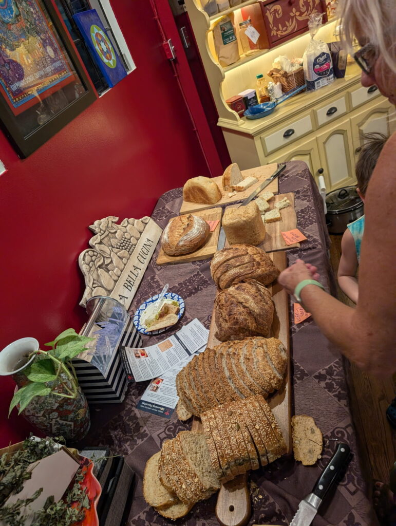 Community bread share in the kitchen at Karma Yoga Center