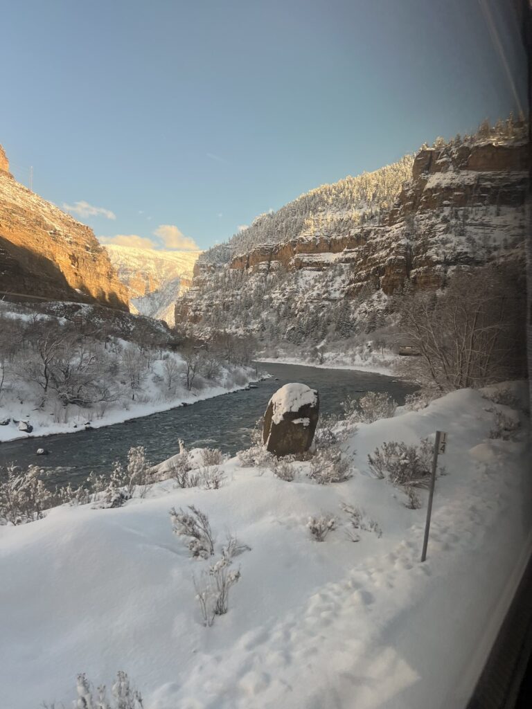 Snowy Glenwood Canyon and the Colorado River seen from the Amtrak California Zephyr