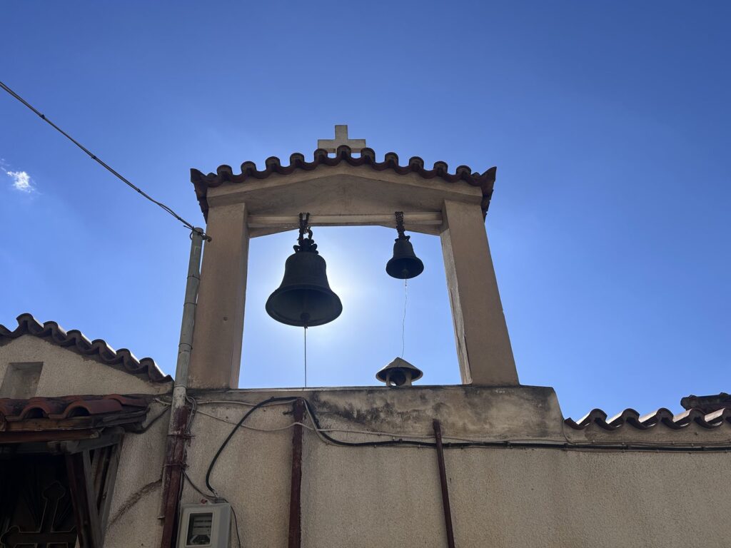 Bell tower against a blue Greek sky in Molyvos