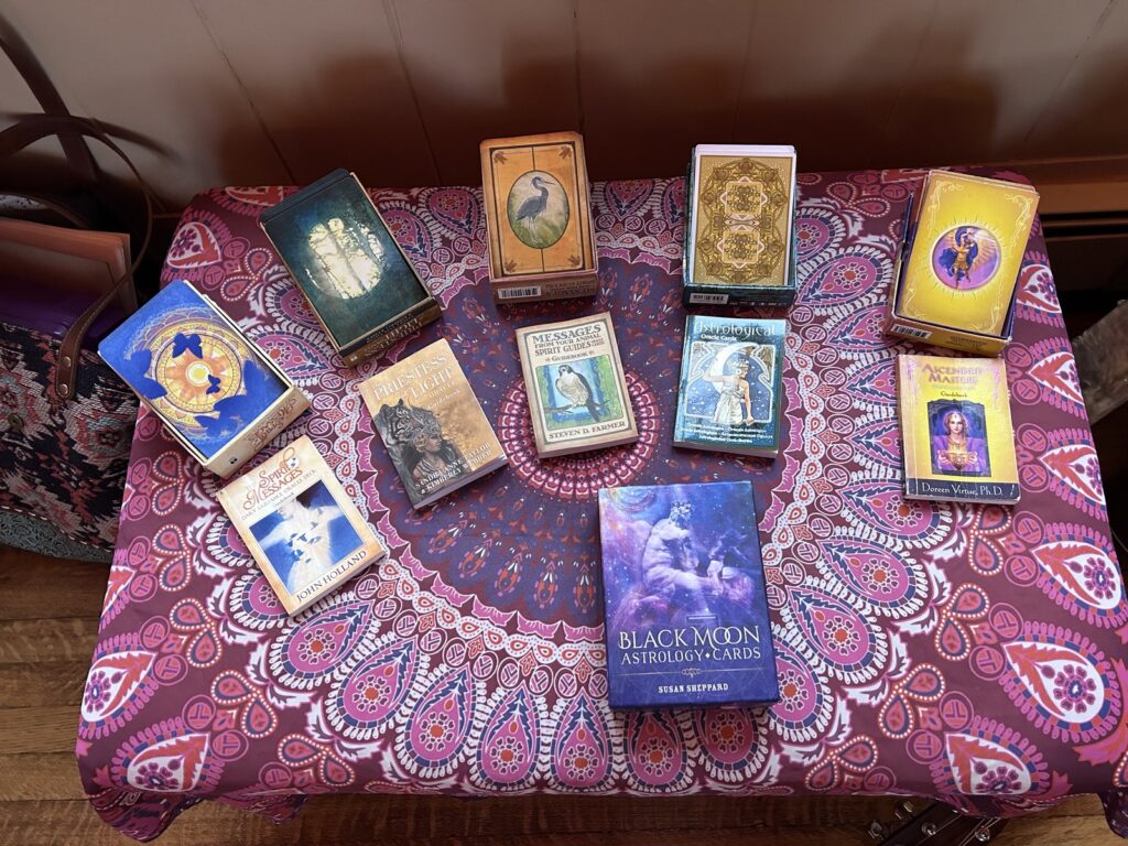 Oracle cards laid on a mandala cloth at the Manitou retreat