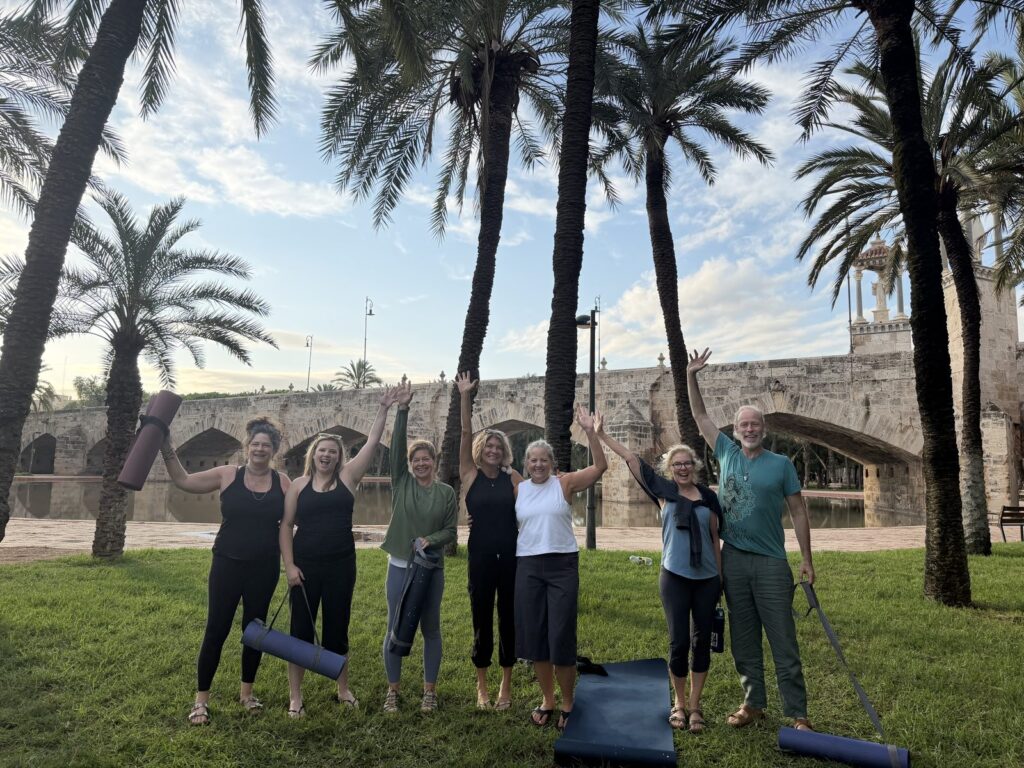 Morning yoga in Turia Park, Valencia, on the Sacred Spain 2026 retreat
