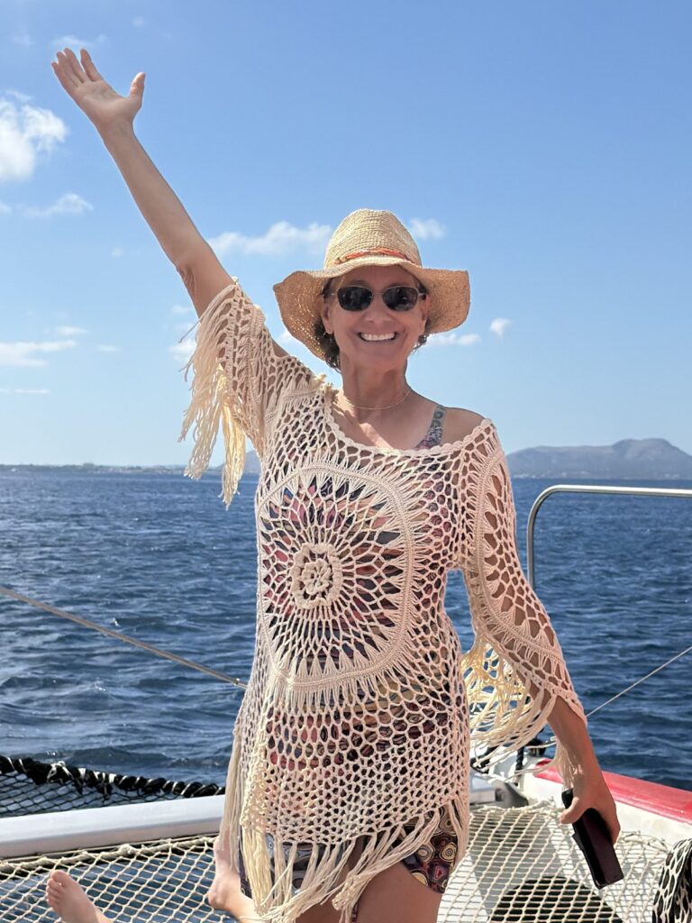 Dancing on the catamaran deck in Alcúdia Bay, Mallorca