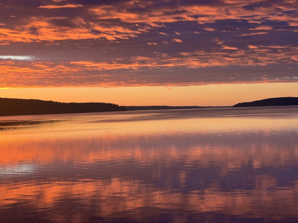 Orange sunset reflected on Puget Sound, Washington