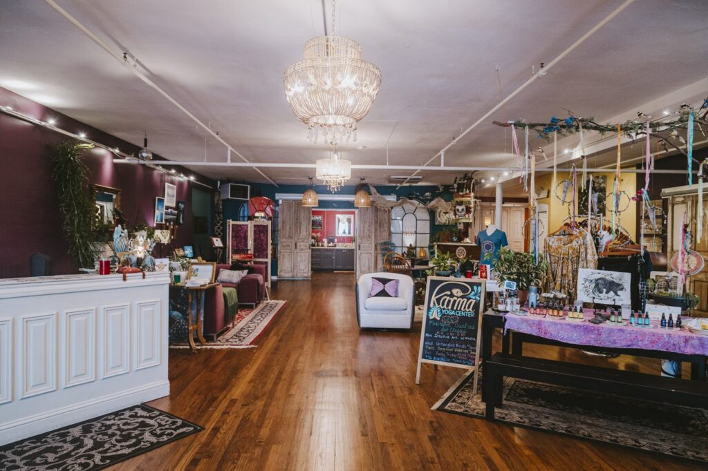 Welcoming lobby and front desk at Karma Yoga Center in Denver