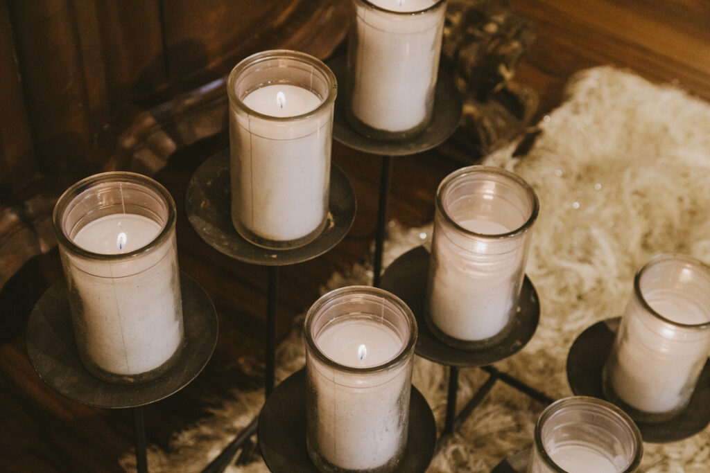 Candles glowing in the meditation room at Karma Yoga Center