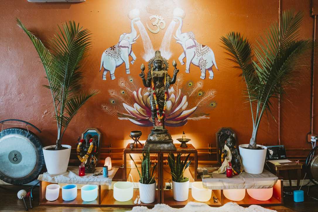 Altar with crystal singing bowls and gong at Karma Yoga Center
