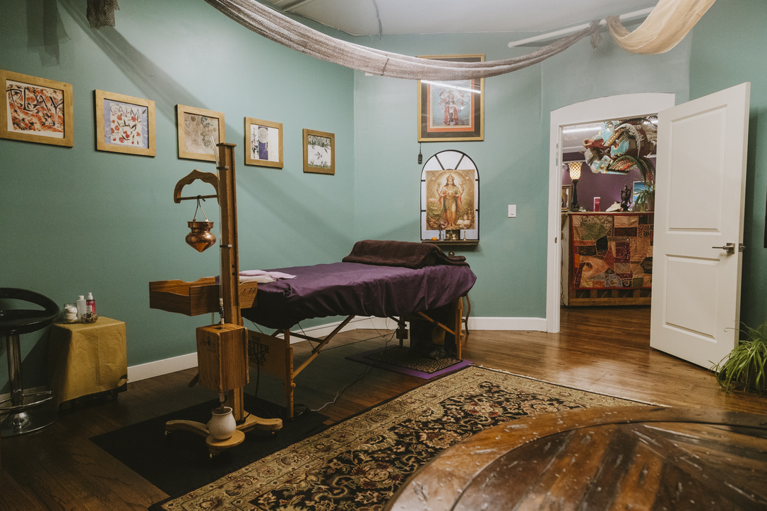 Doorway view into the Soma Spa treatment room at Karma Yoga Center