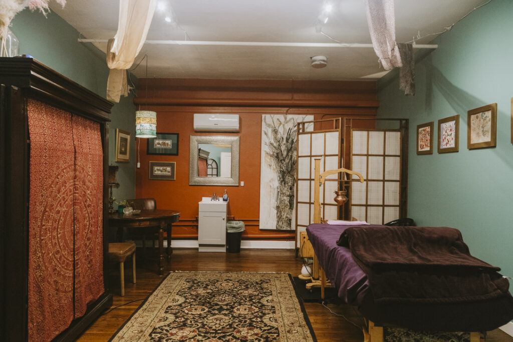 Soma Spa treatment room with Shirodhara stand at Karma Yoga Center, Denver