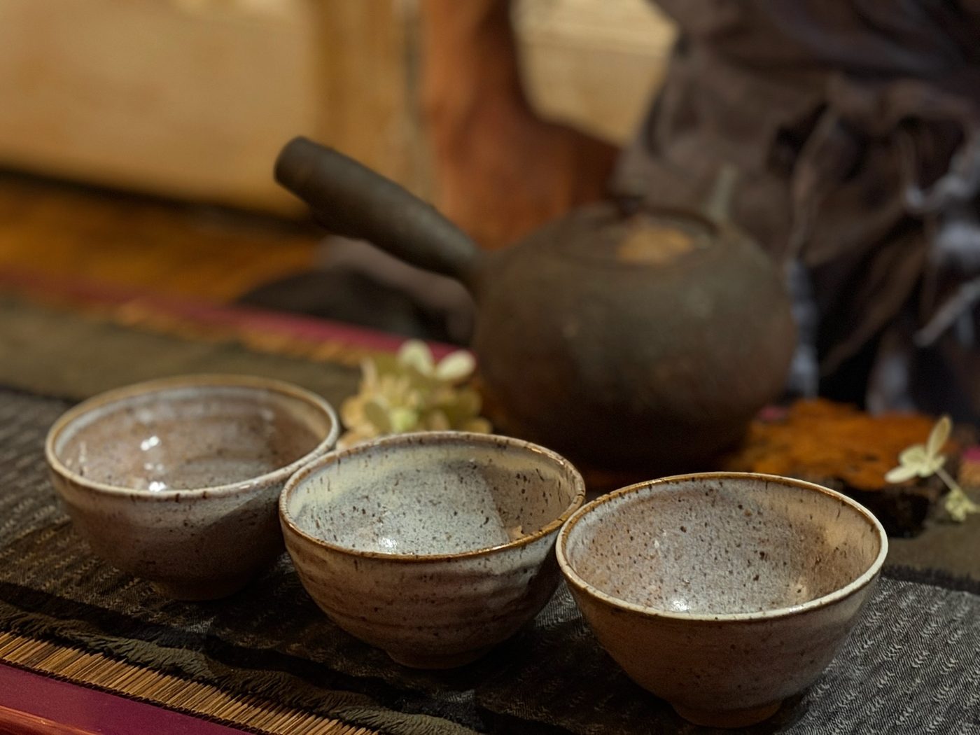 Three handmade tea bowls ready for a tea ceremony in Denver
