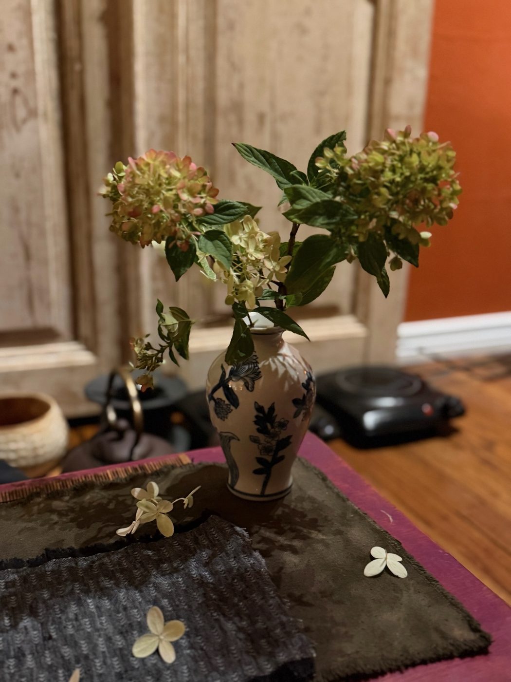 Seasonal garden flowers arranged on the tea table