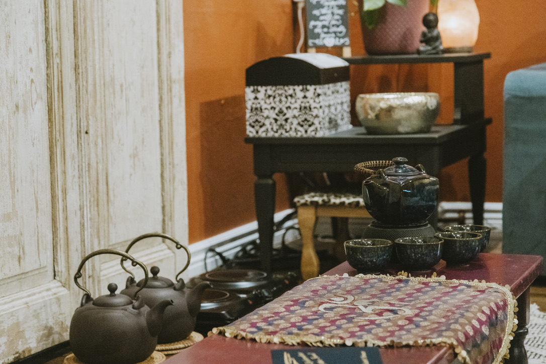 Cast-iron teapots and tea service in the tea room at Karma Yoga Center
