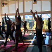 Yoga class with a mountain view on a Karma Yoga Center retreat Yoga class with a mountain view on a Karma Yoga Center retreat