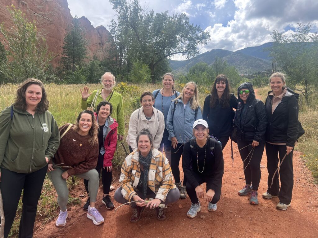 200-hour YTT group on a red rock trail near Manitou Springs, Colorado